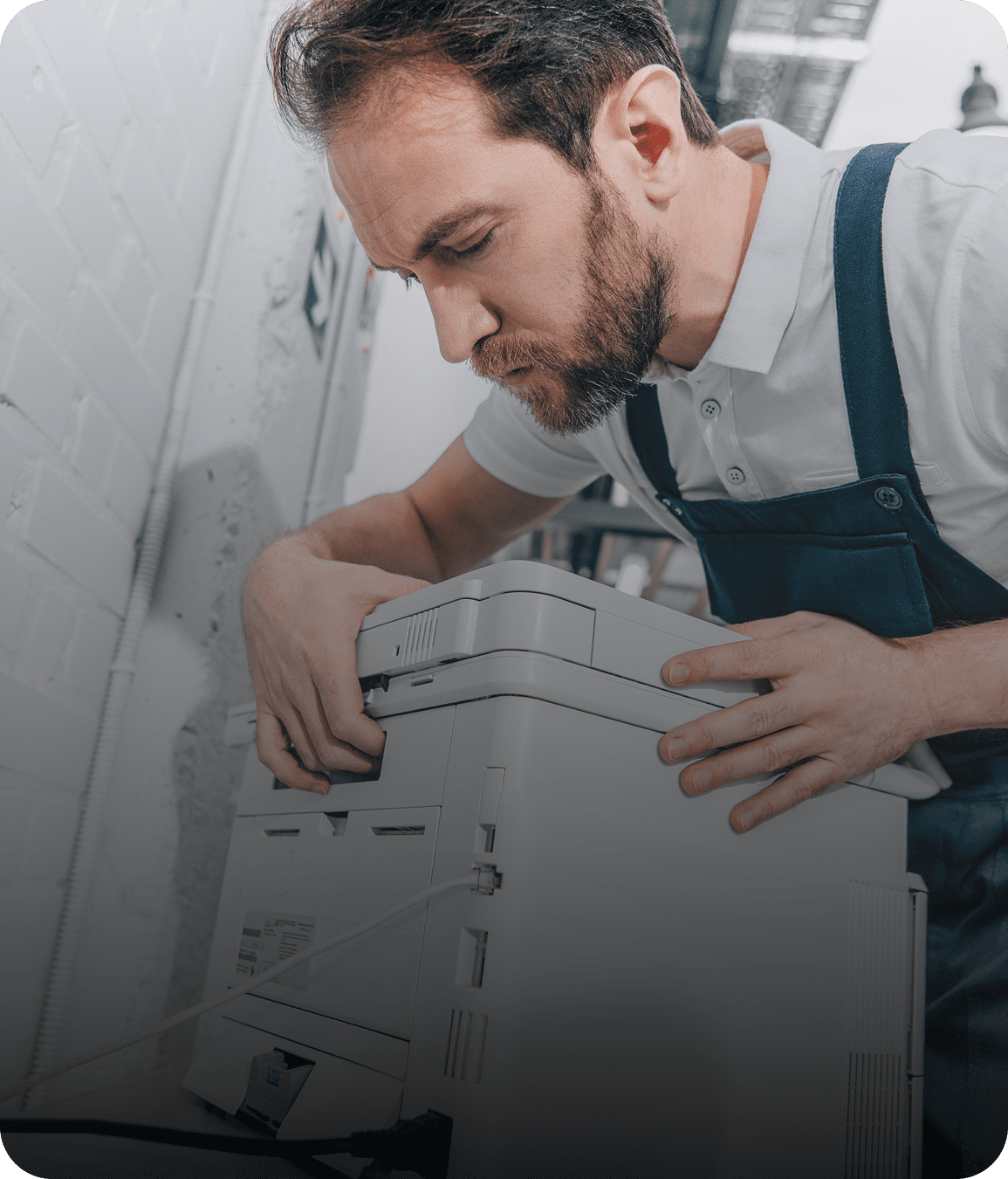 Person working on printer maintenance